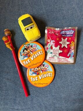 Disney Yellow Toy Car with Orange 1st Visit Buttons & Red Pooh Pencil